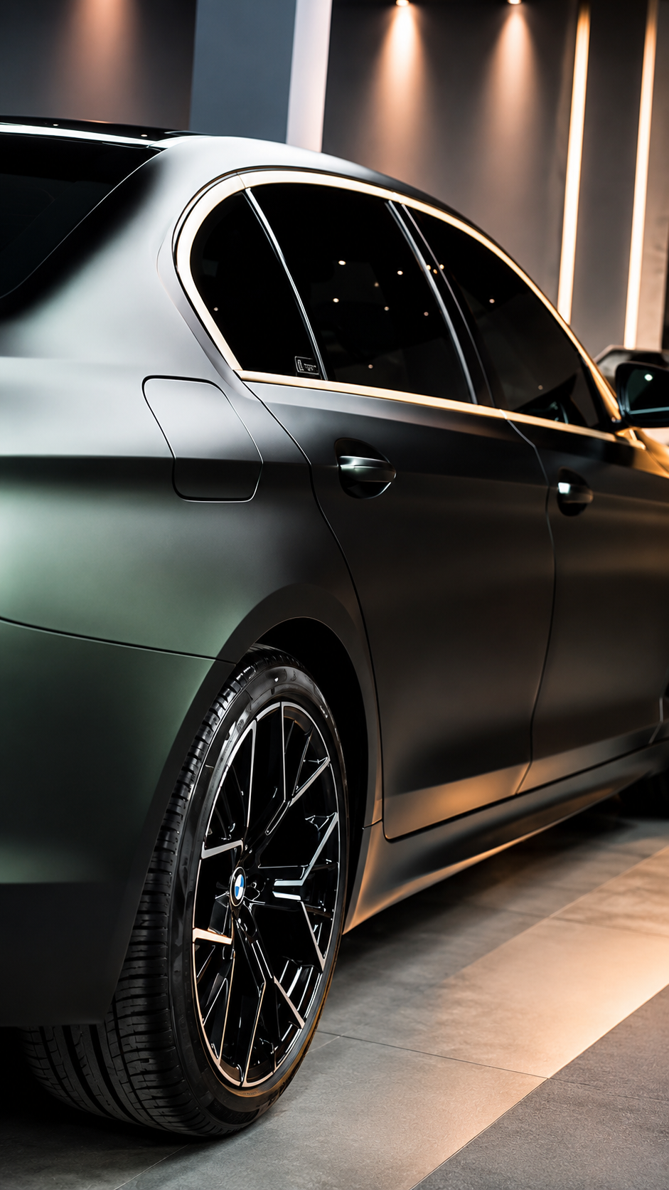 Dark green BMW side profile detailed
