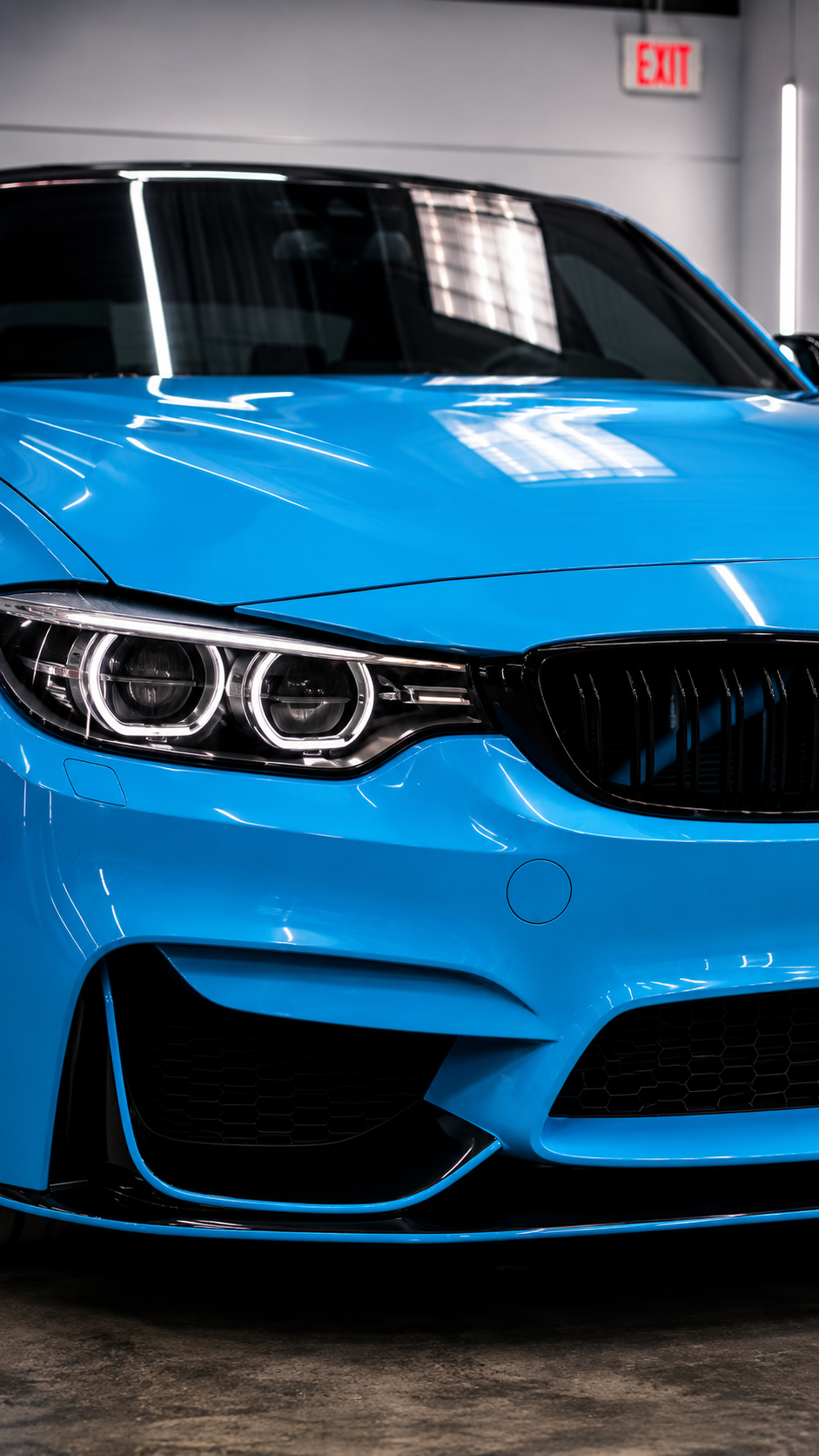 Blue BMW front view detailed